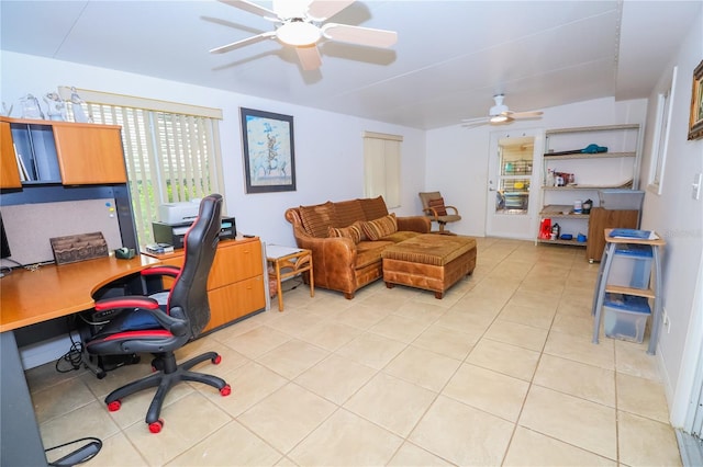 tiled office space with ceiling fan