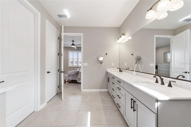 bathroom featuring vanity and tile patterned flooring