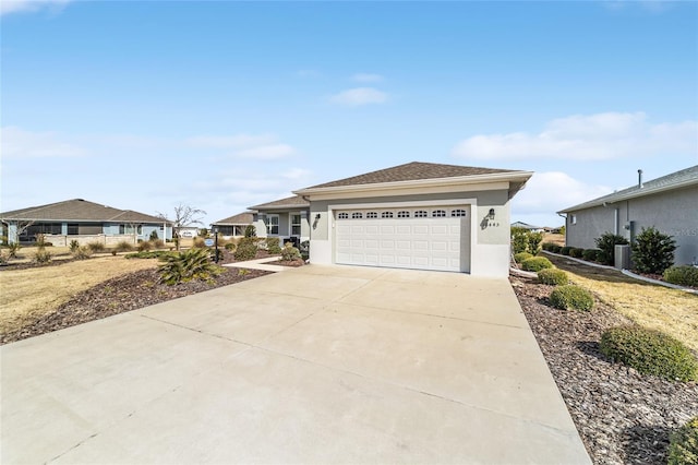 single story home with a garage