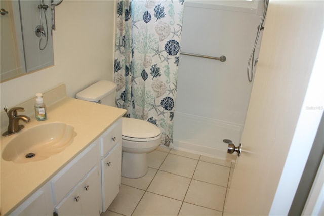 bathroom with a shower with shower curtain, vanity, toilet, and tile patterned flooring