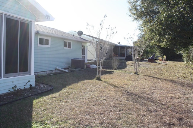 view of yard featuring central AC