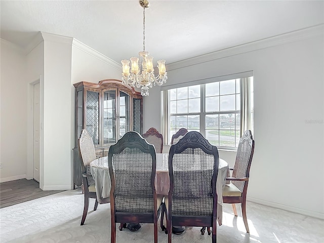 8574 SW 60th Ct, Ocala, FL 34476 - dining room with baseboards, ornamental molding, and an inviting chandelier