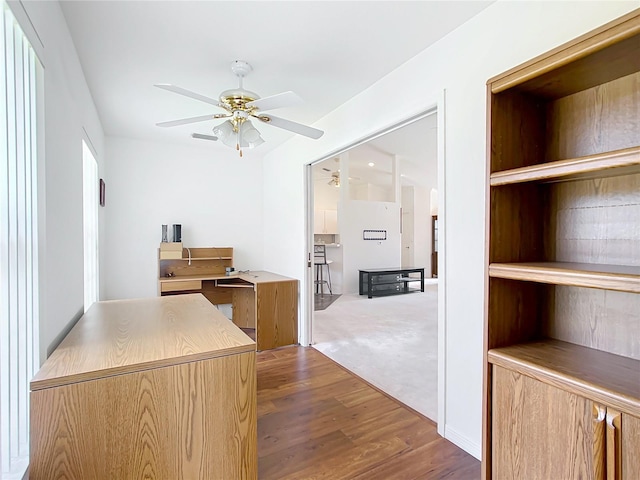 8574 SW 60th Ct, Ocala, FL 34476 - office area featuring ceiling fan and dark wood-style flooring