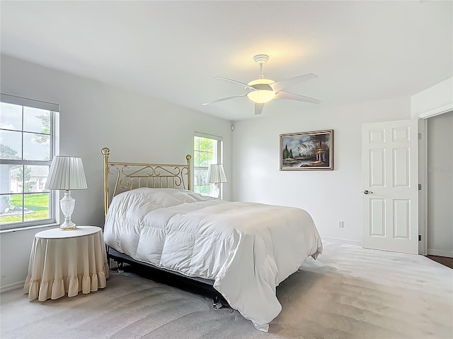 8574 SW 60th Ct, Ocala, FL 34476 - bedroom featuring ceiling fan and baseboards