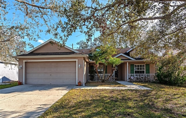 ranch-style house featuring a garage, a front yard, and a porch