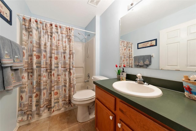 full bathroom featuring shower / bath combo, vanity, tile patterned floors, and toilet