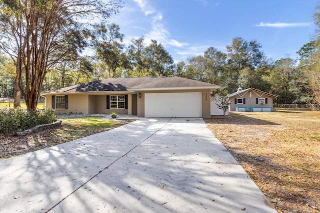 ranch-style home with a garage