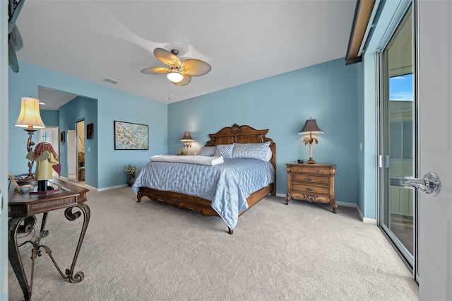 carpeted bedroom featuring ceiling fan