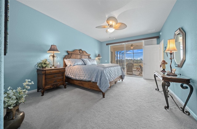 carpeted bedroom with access to outside and ceiling fan