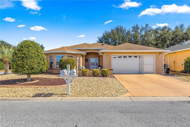 single story home featuring a garage