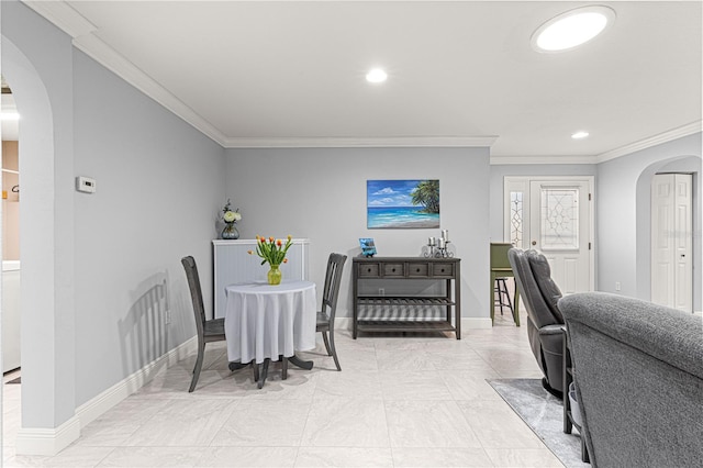 dining room with crown molding