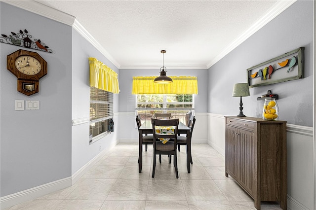 tiled dining area with ornamental molding and a textured ceiling