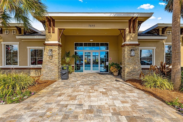 doorway to property featuring french doors