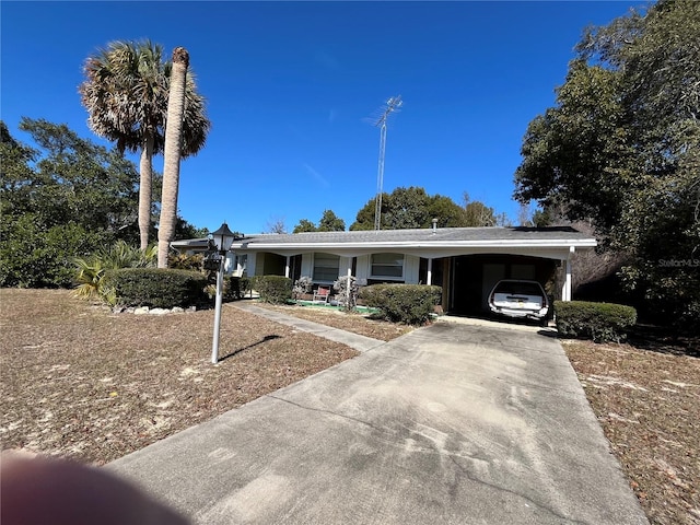 single story home with a carport