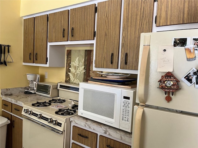 kitchen featuring white appliances