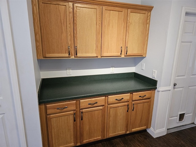 kitchen featuring dark wood-type flooring