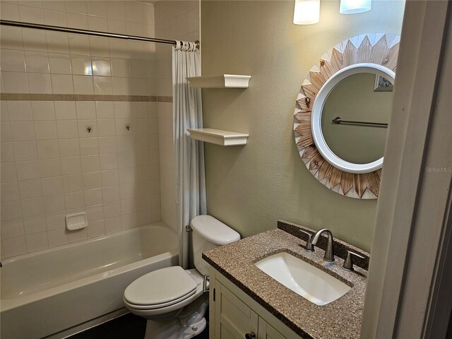 full bathroom with vanity, toilet, and shower / bath combo