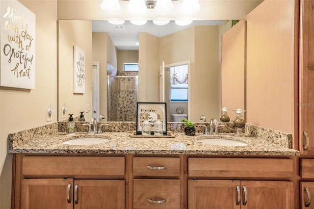 bathroom featuring vanity and walk in shower