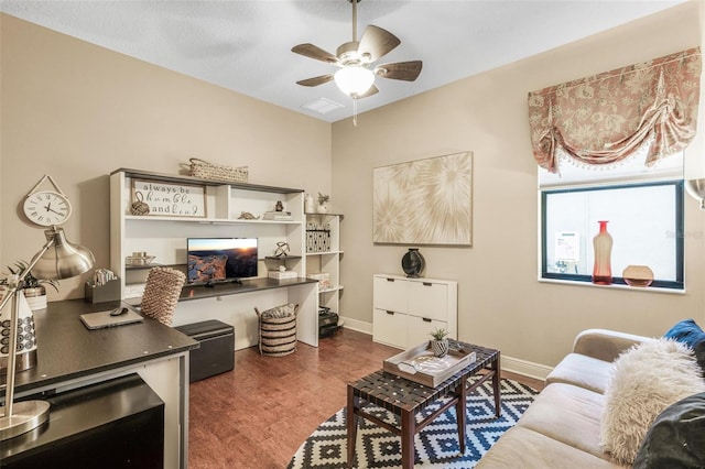 office space featuring dark wood-type flooring and ceiling fan