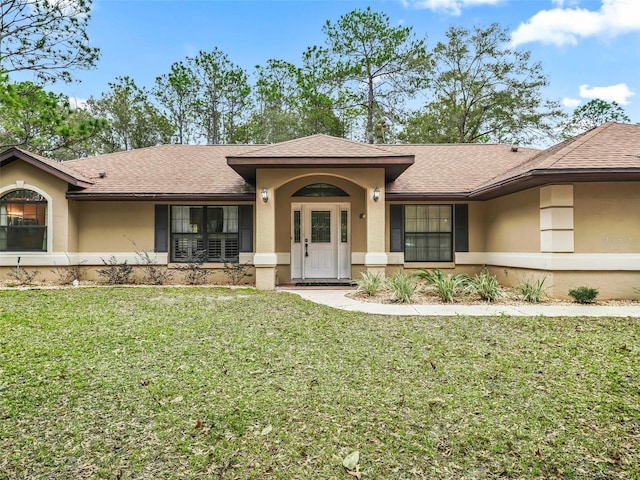 view of front of house with a front yard