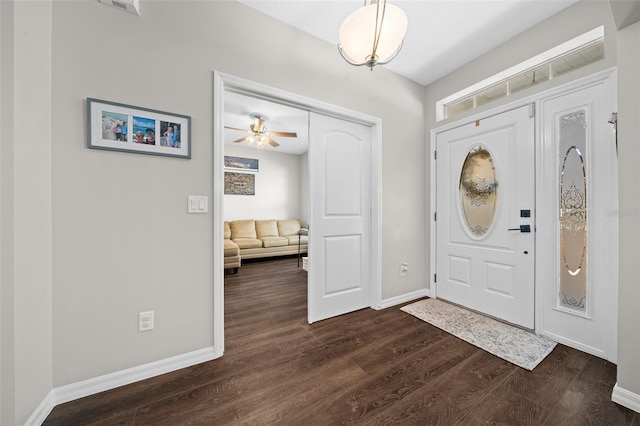 foyer with dark hardwood / wood-style flooring