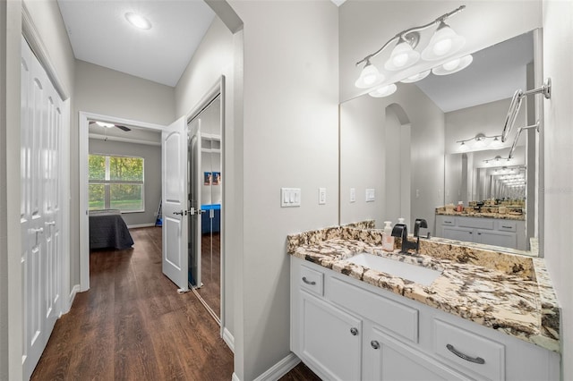 bathroom featuring vanity and hardwood / wood-style flooring