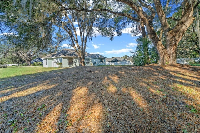 view of front of home with a front lawn