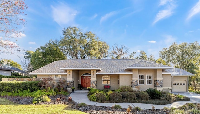 view of front of property featuring a garage