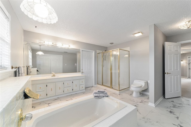 full bathroom featuring vanity, shower with separate bathtub, a textured ceiling, and toilet