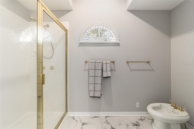 bathroom featuring a bidet and a shower with shower door