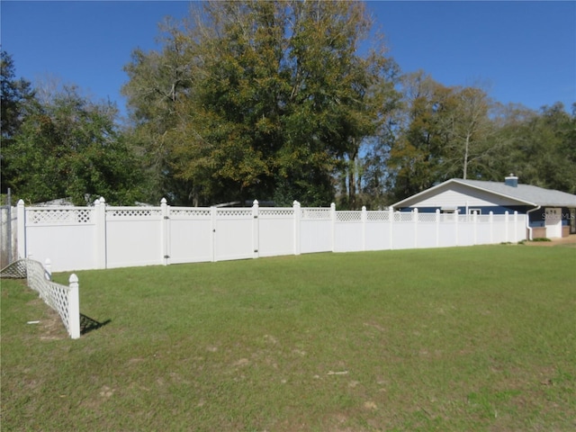 view of yard featuring fence