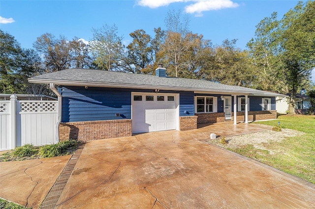 ranch-style house with a garage, brick siding, fence, concrete driveway, and a chimney