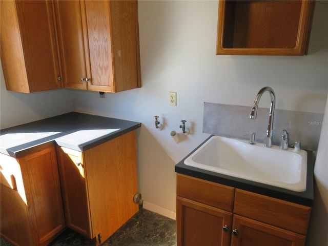 laundry room with a sink