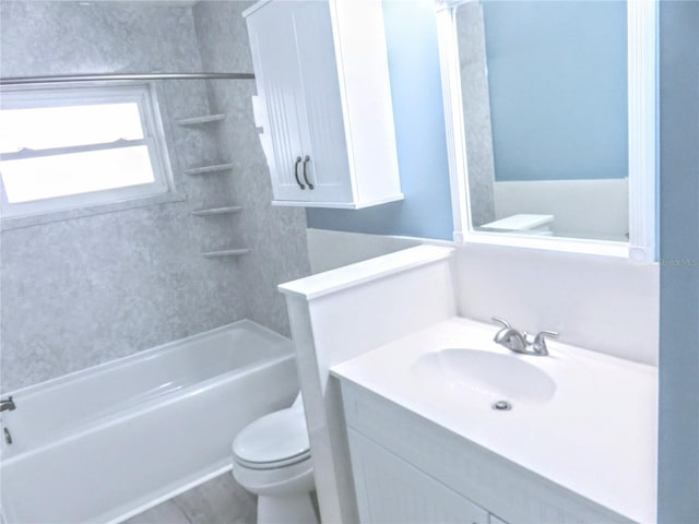 bathroom featuring shower / tub combination, vanity, and toilet