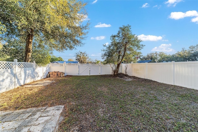 view of yard featuring a fenced backyard