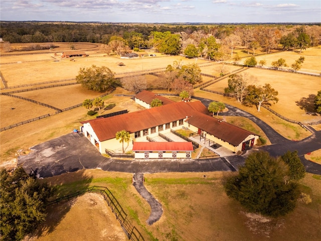 birds eye view of property featuring a rural view