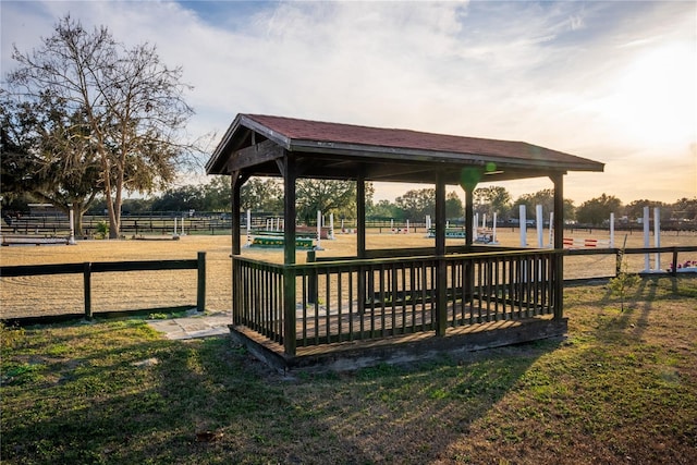 view of community with fence