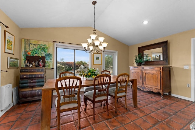 dining room with lofted ceiling, an inviting chandelier, and baseboards