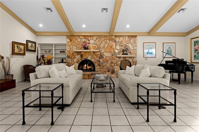 living room with light tile patterned floors, visible vents, a stone fireplace, beamed ceiling, and baseboards