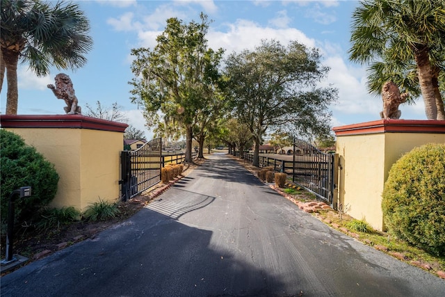 view of street featuring a gate