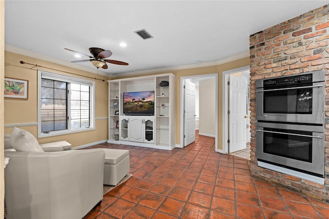 living room featuring built in shelves, ornamental molding, visible vents, and baseboards