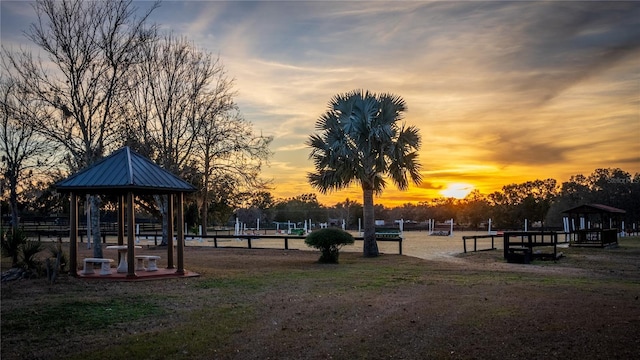 view of community featuring fence