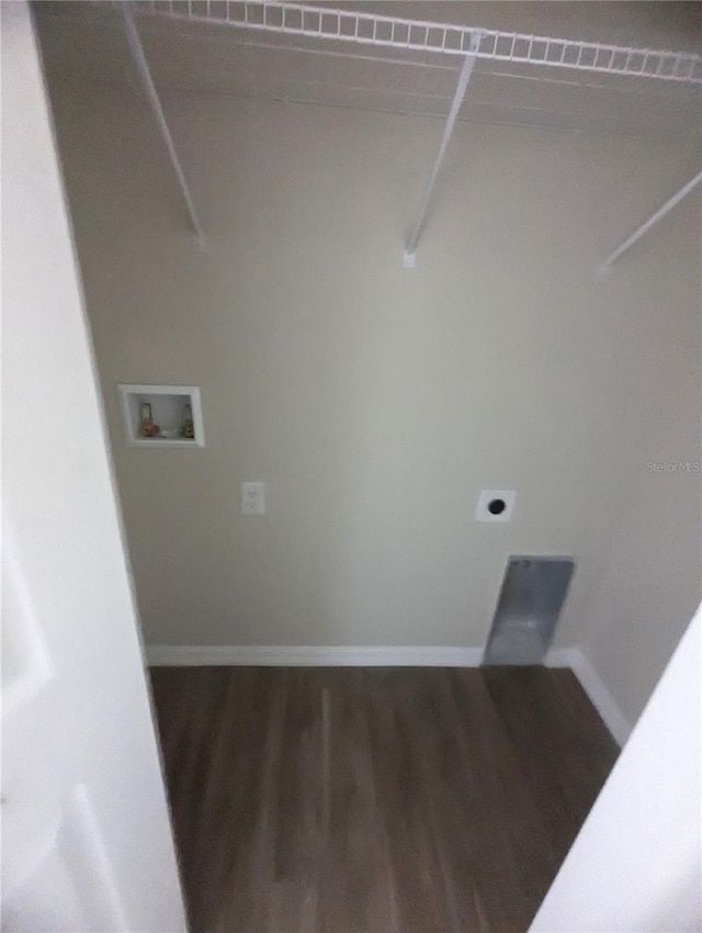 laundry room with hookup for an electric dryer, dark wood-type flooring, and washer hookup