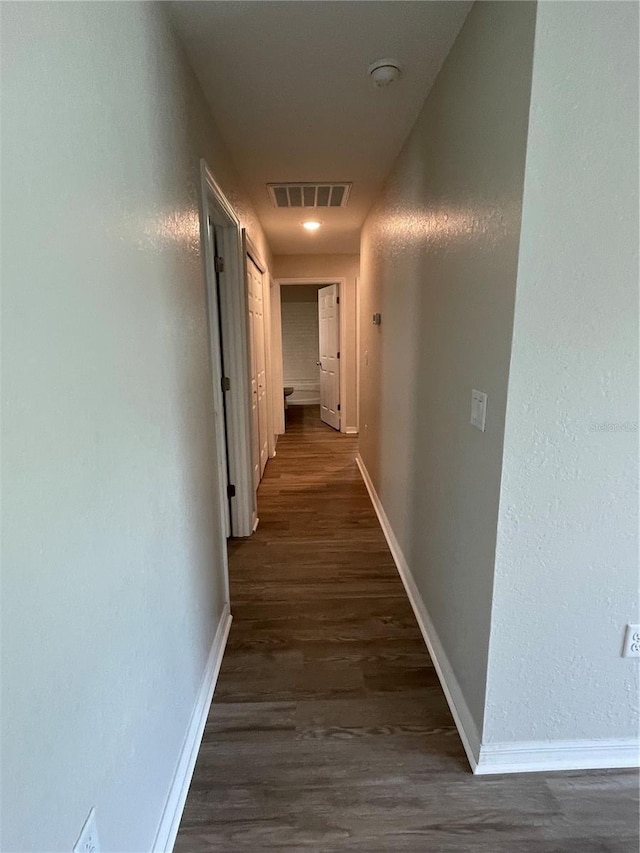 2792 SW 161st Loop, Ocala, FL 34473 - hallway featuring baseboards and dark wood-style flooring