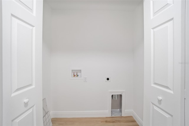 washroom featuring wood-type flooring, electric dryer hookup, and washer hookup