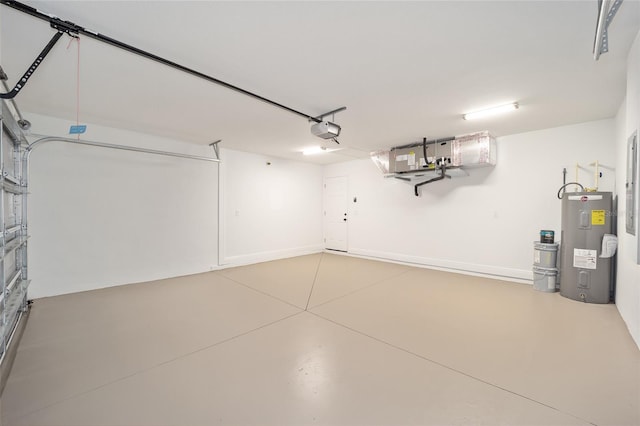 garage with a garage door opener and electric water heater