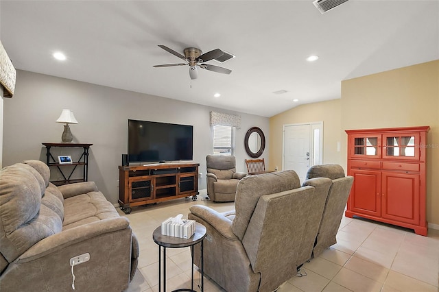 living room with lofted ceiling, light tile patterned floors, and ceiling fan