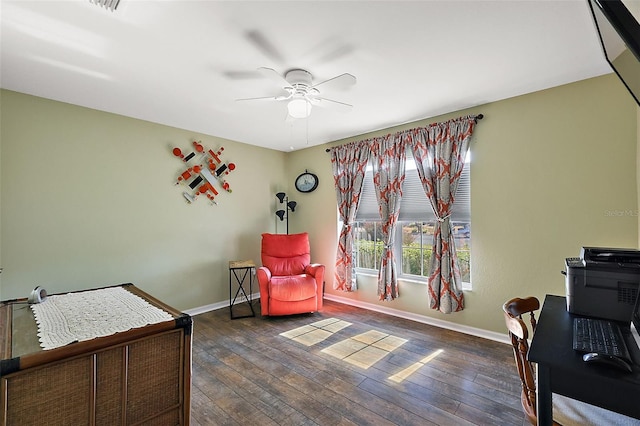 bedroom featuring dark wood-type flooring and ceiling fan