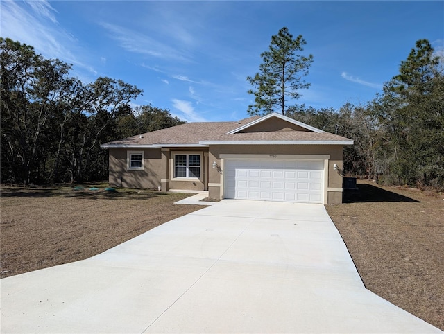 ranch-style house featuring a garage