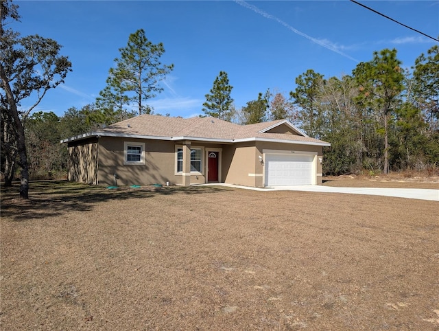 single story home featuring a garage